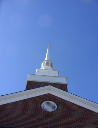Wood steeple with masonry repaired in Georgia.
